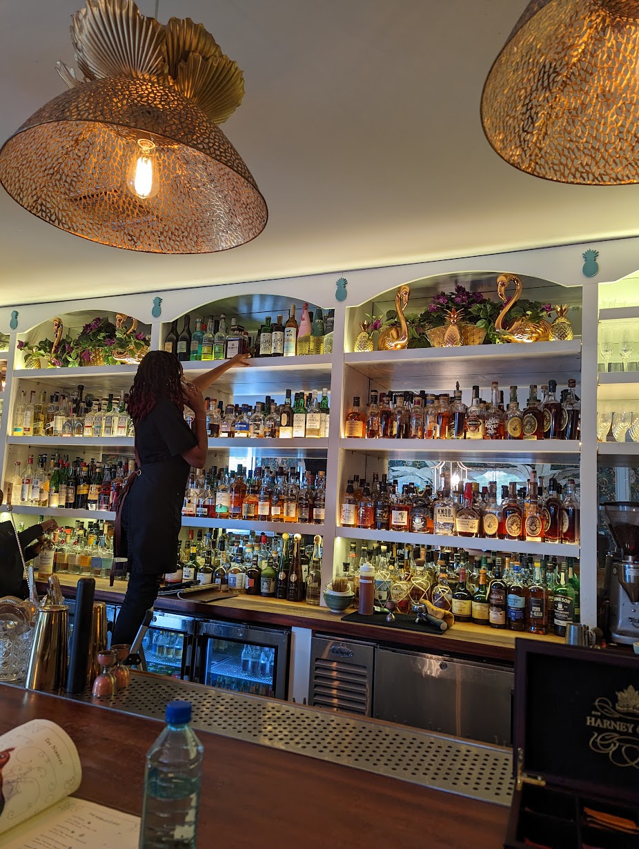 The poor bartender searching for my rather uncommon request.